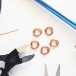 Copper Mobius Rosettes with tools and wire in background