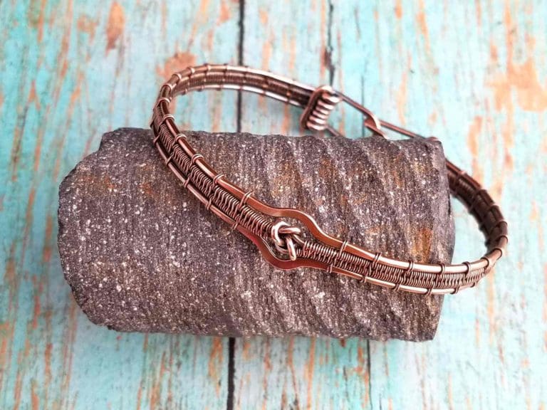 The Lover's Knot Bracelet, made with solid copper wire by Wendi of Door 44 Studios. Learn to make this pretty copper bracelet with this free tutorial.