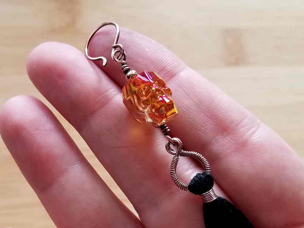 Step 5 - Thread the ear wire onto the top loop of your beaded connector. Make sure all components are facing forward