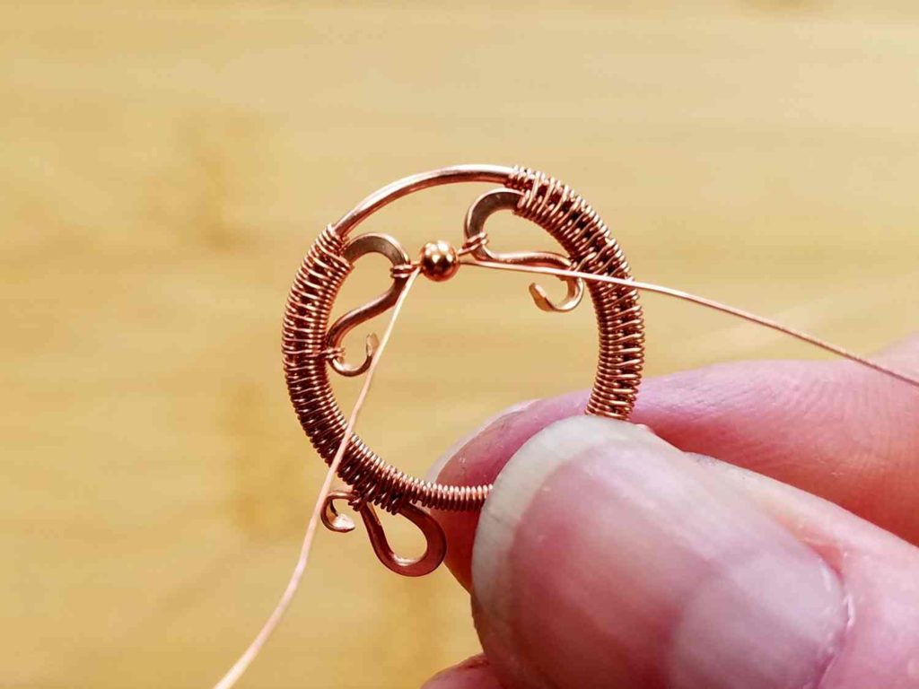 Beads Step 4 - Wrap one end of the suspension wire around the other curved end of Wire 1, as shown.