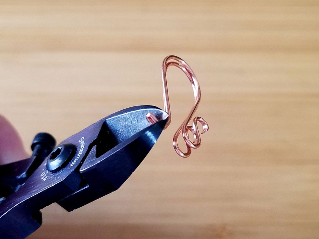 Step 14 - Separate the two wires by trimming off the fold with wire cutters, as shown.