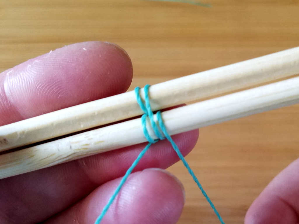 Step 6 - Wrap the weaving wire once around Core 1 to begin the second pattern repeat, as shown.
