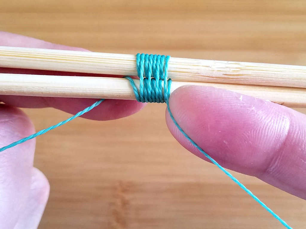 TIP: Use the tip of your finger to gently push each wrap into place as you weave, as shown. This will keep your weave neat, compact, and tidy.
