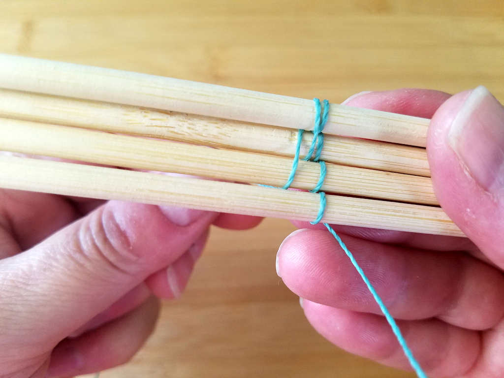 The second double wrap travels over wires 2 and 3 and between wires 1 and 2, as shown.