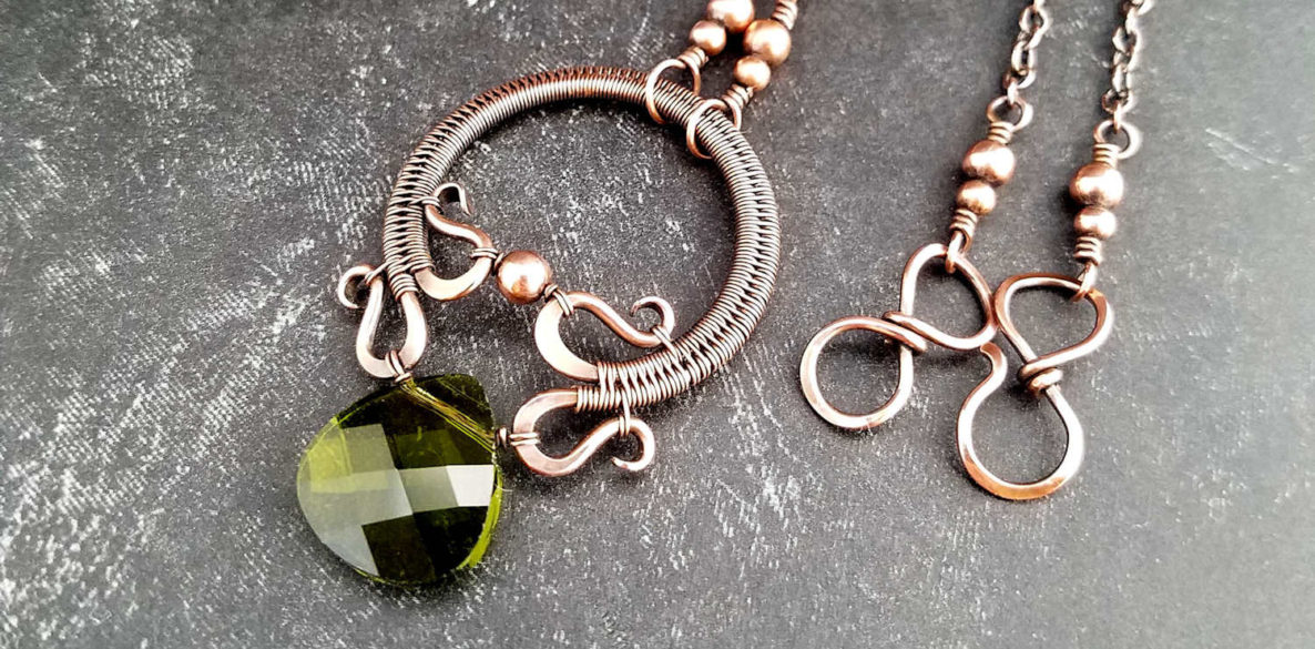 The Rosewood Pendant in copper featuring an olivine crystal briolette - design by Wendi Reamy of Door 44 Studios
