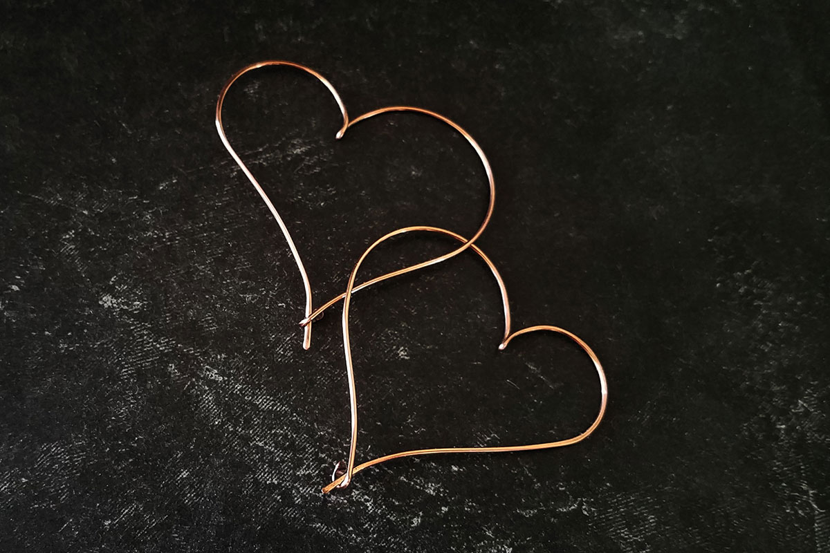 Simple heart hoop earrings made with a single piece of 20g copper wire